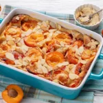 Recette de clafoutis aux abricots avec des amandes effilées en décoration